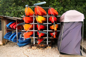 canoes in a stand on the beach