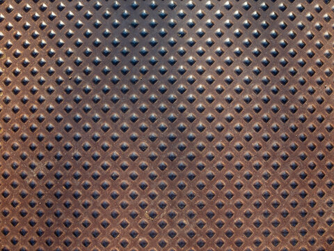 texture of a metal sheet with embossed rhombuses
