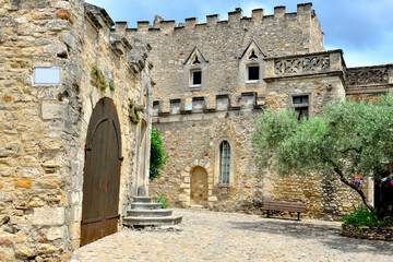 Fototapeta premium facade of old building in a place in a medieval french village Aigueze