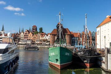 Fototapeta na wymiar Old Town of Gdansk in Poland, Europe, view from the city marina at Motlawa River