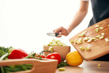 cutting vegetables on a cutting board ingredients for salad fresh vegetables