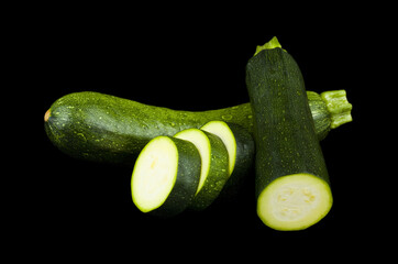 Vegetable marrow isolated on black background.