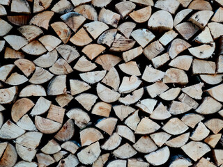 background stacked chopped firewood