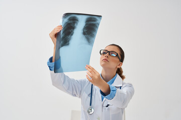 Woman in white coat radiologist research x-ray health