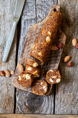 Fig and nut salami. Healthy vegan candy. Coffee