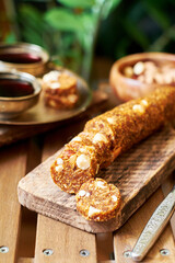 Fig and nut salami. Healthy vegan candy. Coffee
