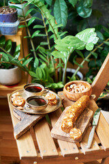 Fig and nut salami. Healthy vegan candy. Coffee