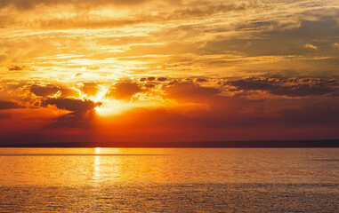Colorful ocean beach sunrise. Dawn over the sea. Nature composition