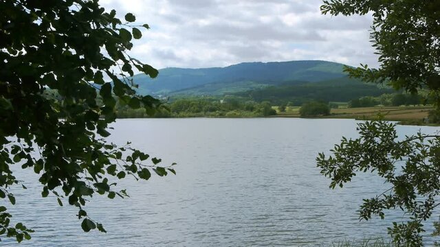 Lake, trees and mountains in the Morvan, France