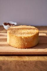 Sponge cake on a wooden table.