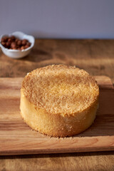 Sponge cake on a wooden table.
