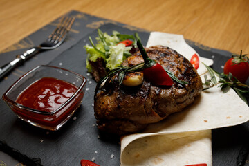 steak on the board, restaurant meat hand