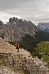 Fototapeta na wymiar Hiking and backpacking through the amazing nature and landscapes of the Italian Dolomite Mountains in Northern Italy