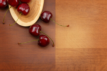 cherries on wooden background