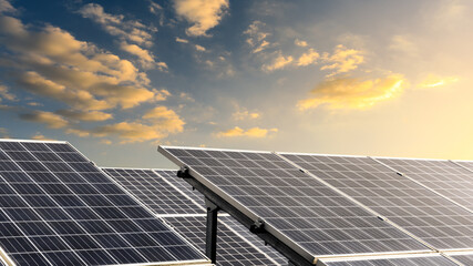 Solar power panels and beautiful natural landscape at sunset in summer in China