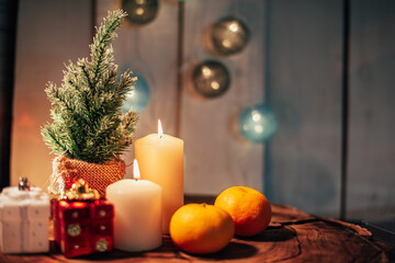 Christmas decor with candles and gifts