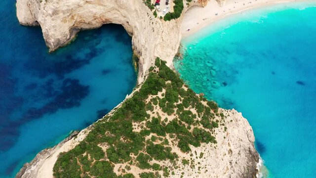 Aerial view of Lefkada coast Porto Katsiki with turquoise sea water and tall cliffs, summertime vacations in Greece.