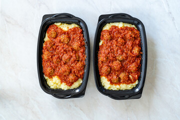 Take Away Turkish Food Meatballs with Potato Puree and Tomato Paste.