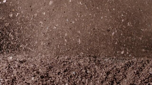 Explosion of dirty ground pattern in slow-motion