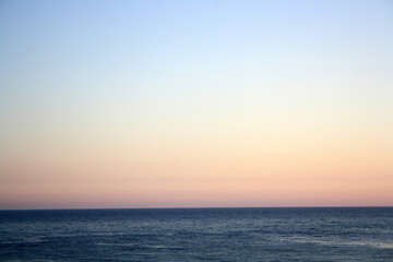 Naklejka na ściany i meble The Black Sea. Beautiful sea horizon and blue water. Evening sea. Natural photophone.