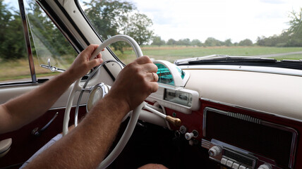 In the cockpit of a vintage car