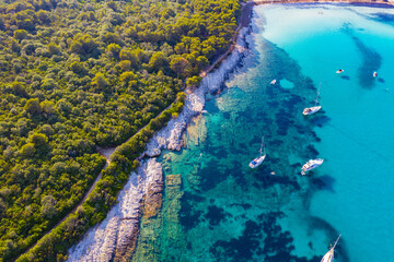 Aerial view of sailing boats in a beautiful azure turquoise lagoon on Sakarun beach bay on Dugi Otok island, Croatia, beautiful seascape