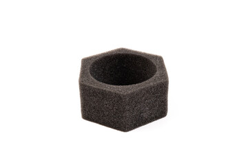 piece of foam rubber on white background. Black sponge