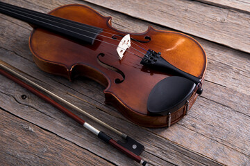 Fototapeta na wymiar Classical violin on wooden background