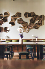 Empty table with vase in restaurant interior
