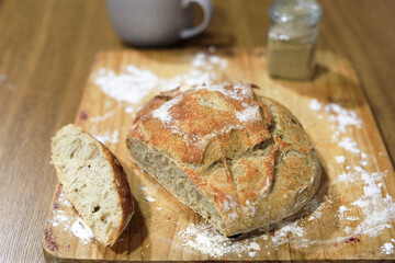 Homemade sourdough bread in a conventional oven. - 449175406