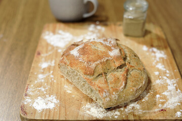 Homemade sourdough bread in a conventional oven. - 449175416