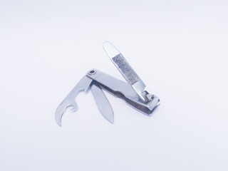 nail cutter with knife and bottle opener, isolated on white background