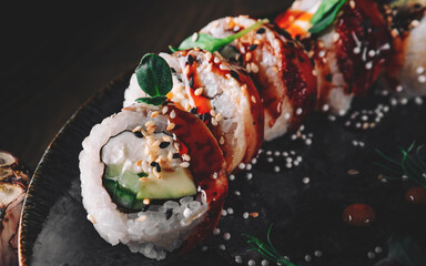 sushi roll in plate on wooden table background