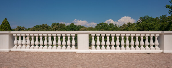 Luxury classical white stone balustrade fence on sidewalk of old castle area - obrazy, fototapety, plakaty