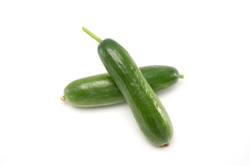 Fresh mini cucumbers isolated on white background. Healthy food