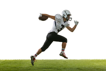 Fototapeta na wymiar Portrait of American football player training isolated on white studio background with green grass. Concept of sport, competition