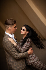  confident couple in a formal suit 