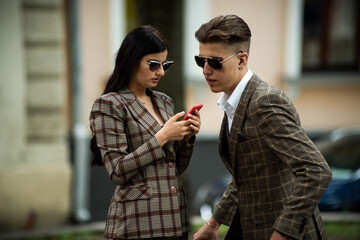  confident couple in a formal suit 