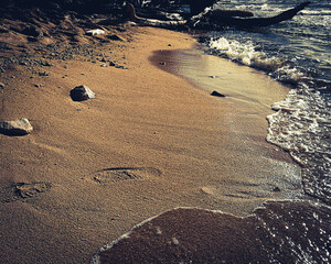 footprints on the beach