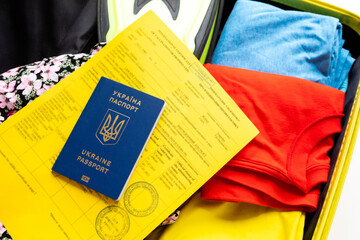 ukraine covid passport vaccination at bags with stuff - obrazy, fototapety, plakaty