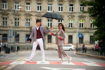 Stylish couple in the city. Young students