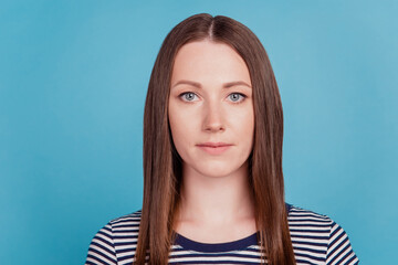 Portrait of charming cute worker lady look camera on blue background