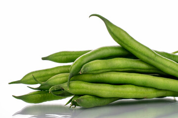 Several ripe green beans, close-up, isolated on white.