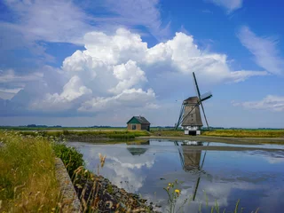 Foto auf Alu-Dibond De Molen van het Noorden (Texel) met mooie wolkenformaties © W