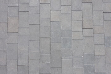 Background - simple gray concrete pavement from above
