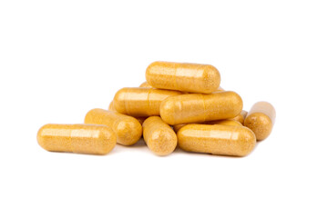 Yellow pills slide isolated on white background. Vitamins are antibiotics. Cure for diseases
