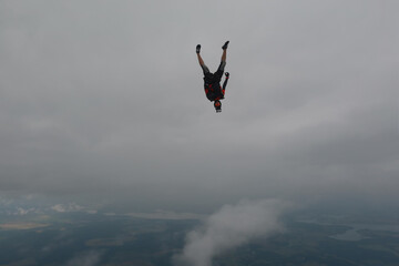 Fototapeta na wymiar Skydiving. A freefly jump in headdown position.
