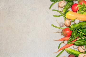 Fototapeta na wymiar fresh vegetables on wooden background