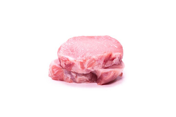 Raw pork pieces isolated on a white background.