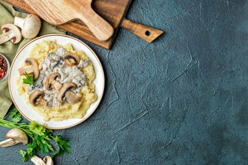 Plate with tasty mashed potatoes, mushrooms and ingredients on color background